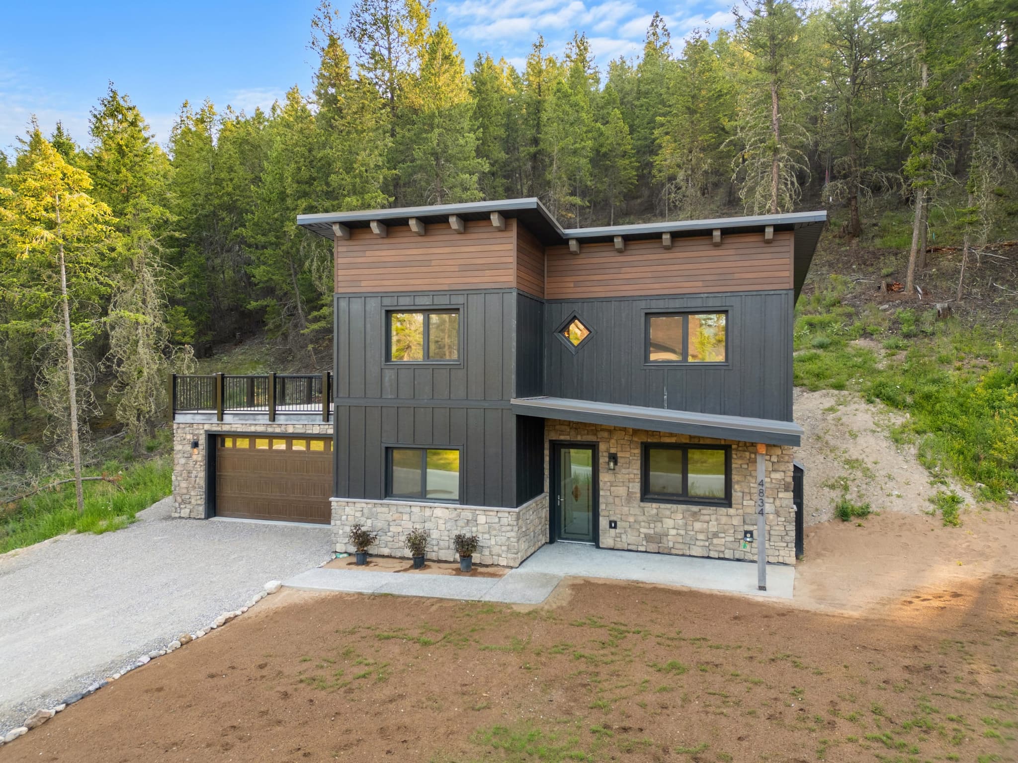 Modern custom home exterior — Mountain View Drive, Fairmont Hot Springs