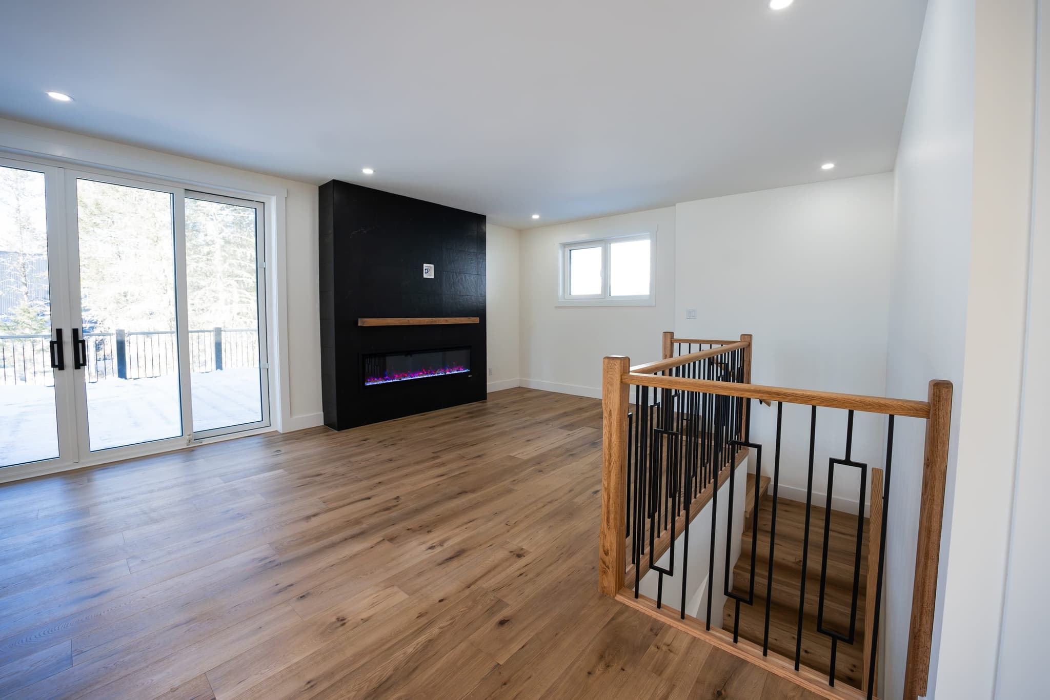 Upper-level living space with stair landing