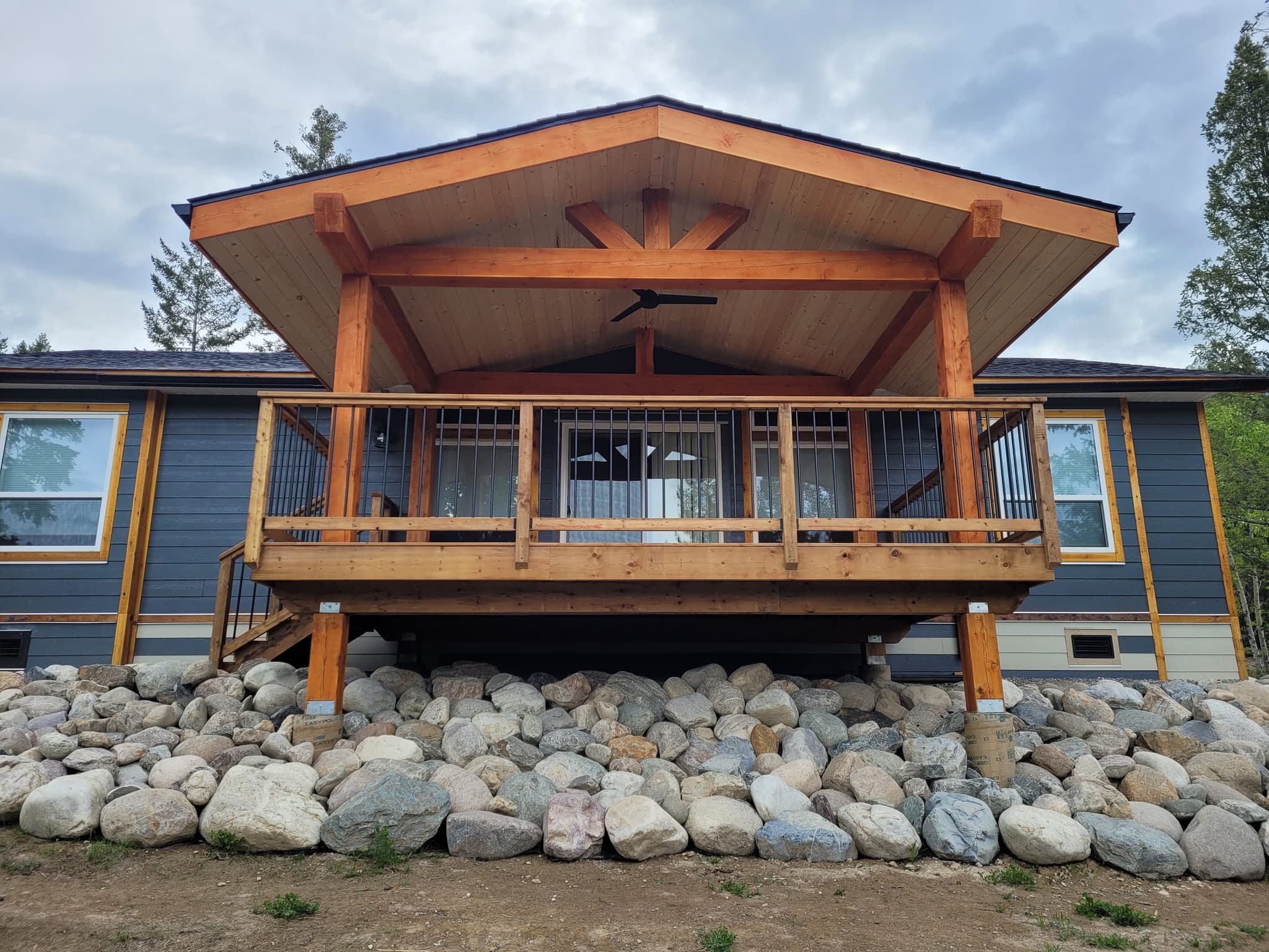 Mountain home with timber-framed entry porch