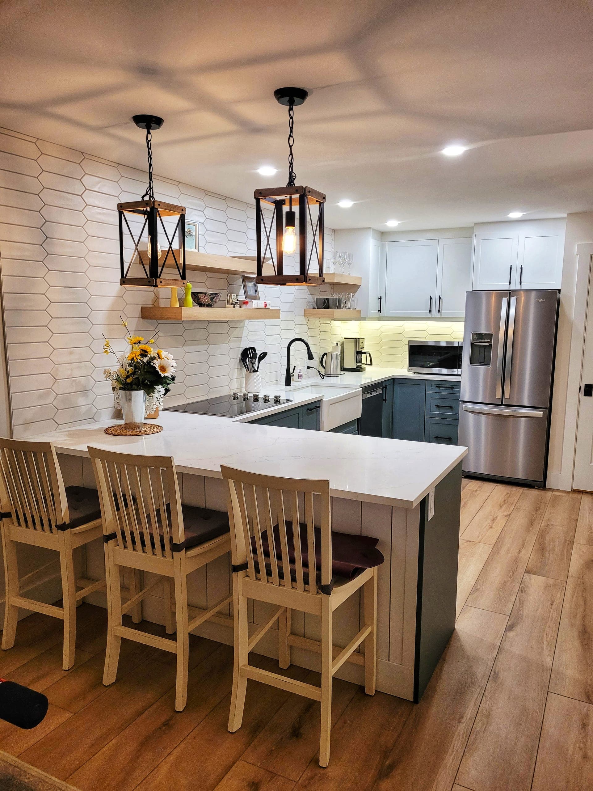 Hex-tile backsplash kitchen with pendant lighting