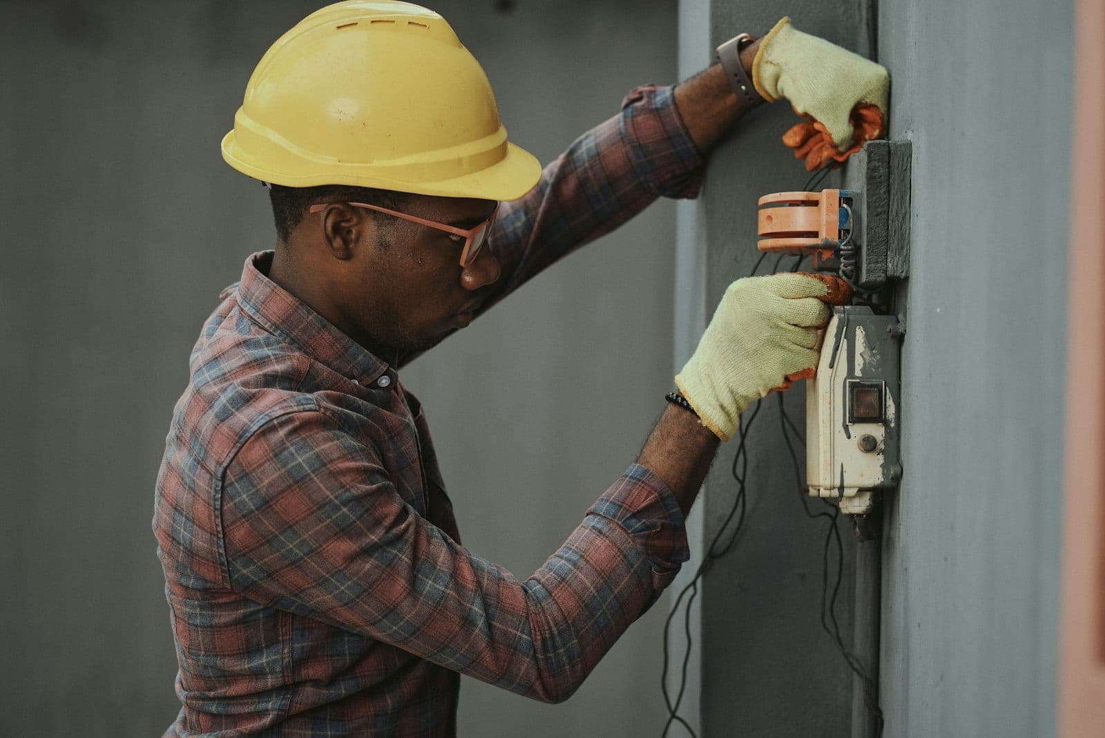 Licensed electrician working on residential wiring